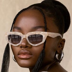 DEZI on read sunglasses